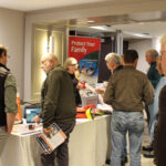 sponsor display tables at the Spring Seminar